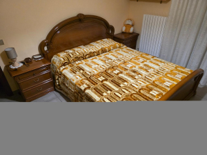 Camera Matrimoniale, como' comodini e specchio